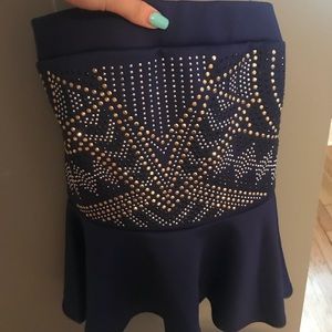 Strapless, jeweled top